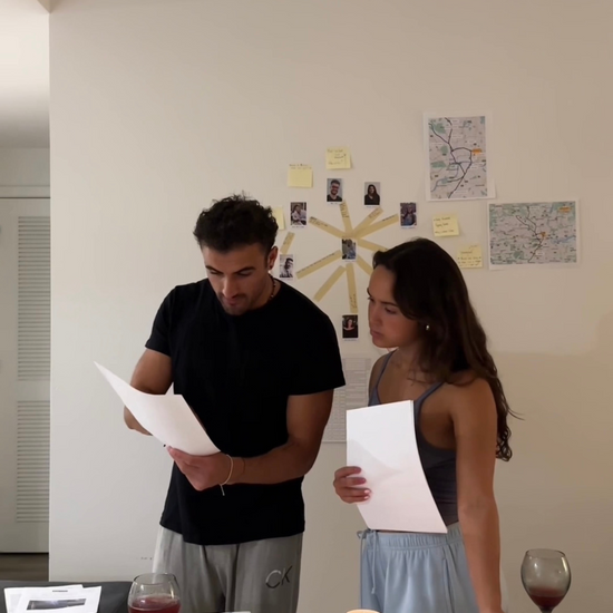 Couple playing cold case file game